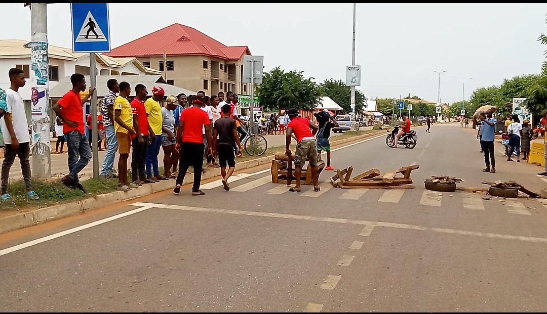 The angry youth block a street in Nkoranza